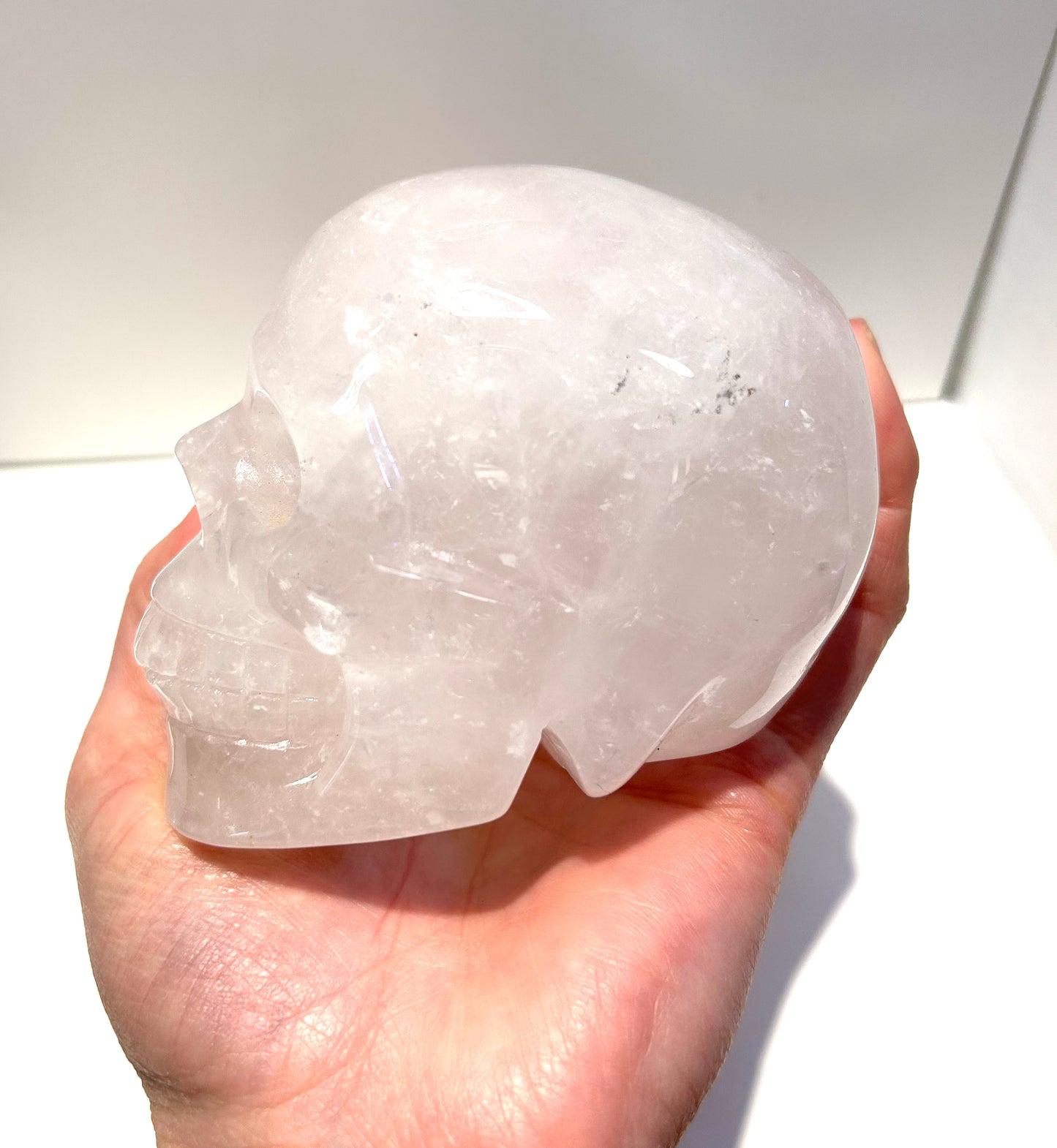 Large Clear Quartz Skull Carving With Rainbow Inclusions Statement Piece