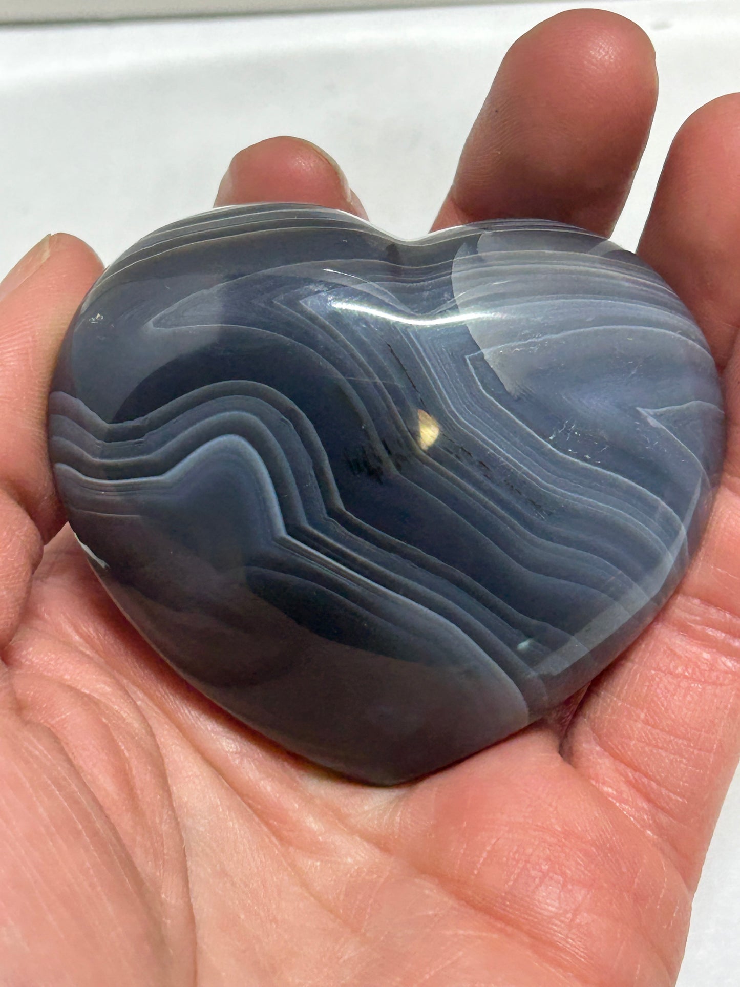 Agate with Banding Carved Crystal Heart Palm Stone